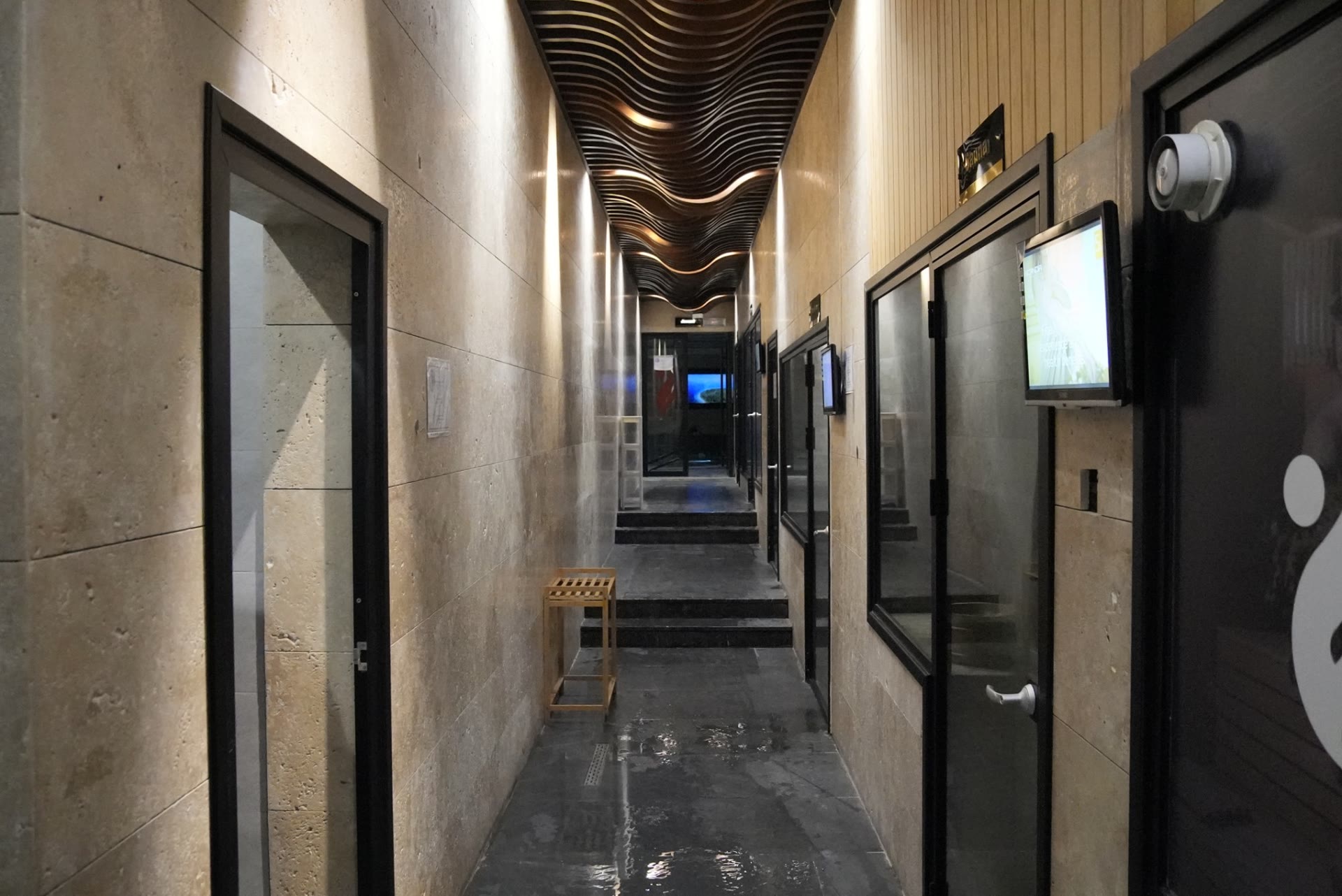 The stone corridor to the sauna and steam rooms